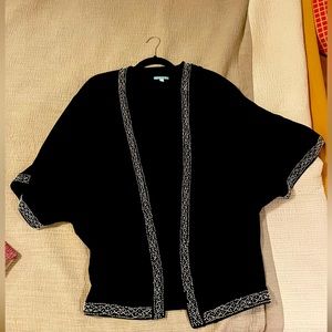 Incredible hand beaded light sweater. Very sophisticated and comfortable. 💎